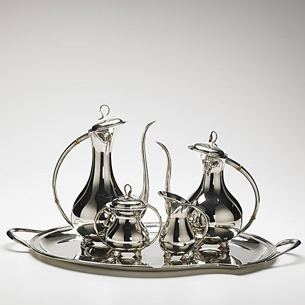 EUGEN FERHER: EUGEN FERHER; Sterling silver coffee and tea set on silver-plate tray, 1965; Holloware stamped Sterling 925 EUGEN FERHER 1965, tray stamped HANDWORK EPNS EUGEN FERHER 1965; Tray 25 1/2'', coffee pot 1