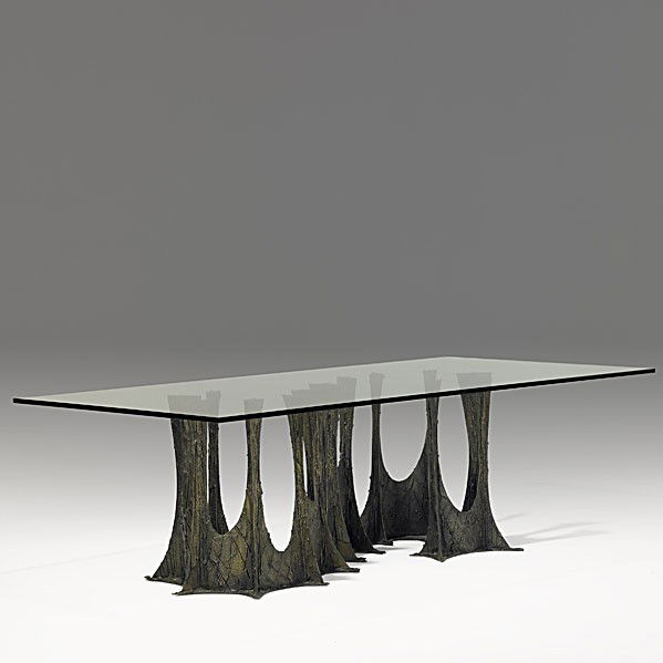 PAUL EVANS: PAUL EVANS; Sculpted bronze and glass dining table on serpentine base, 1973; Signed PE 73. 28 ;3/4'' x 96'' x 48''