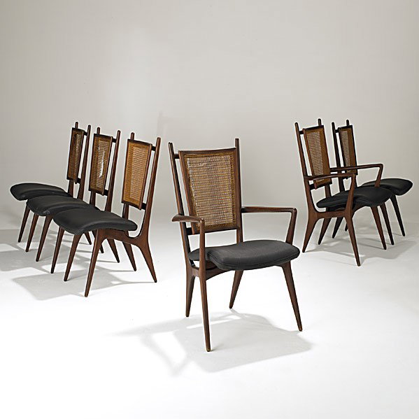 VLADIMIR KAGAN; GROSFELD HOUSE: VLADIMIR KAGAN; GROSFELD HOUSE; Set of six walnut and cane dining chairs, two with arms; Some bear Grosfeld House cloth labels; Armchairs: 40 1/2 '' x 23 1/2'' x 22 1/2''