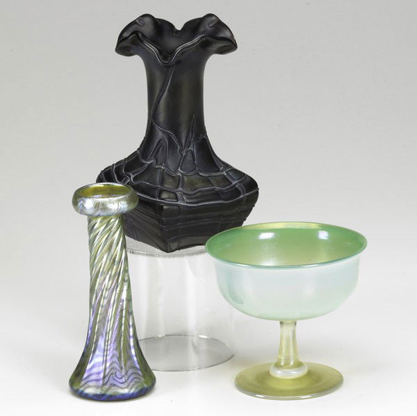 ART GLASS GROUPING: ART GLASS GROUPING; Tiffany Favrile sherbert cup and bud vase, and Loetz style amethyst vase, early 20th c; Cup and bud vase signed; Tallest: 5 1/2''