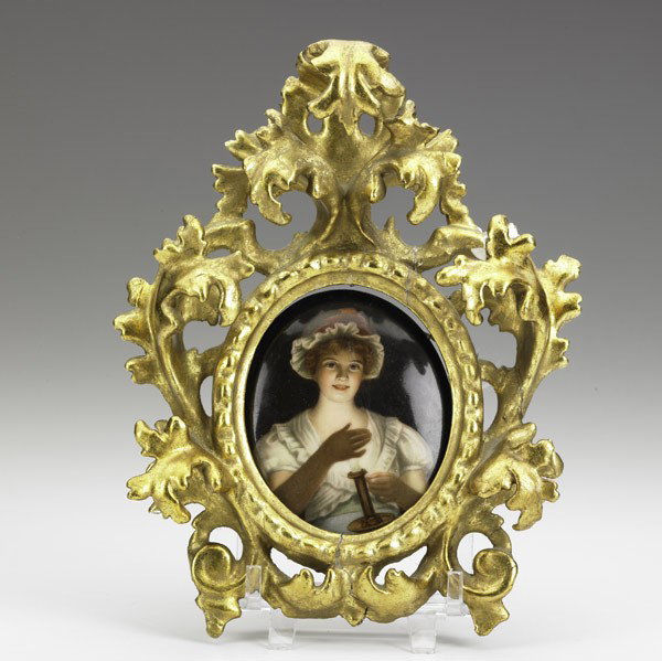 PAINTING ON PORCELAIN: PAINTING ON PORCELAIN; Depicting a maiden with a chamberstick in elaborate gilt frame, 19th c.; Illegibly stamped, signed Wagner; 7 1/2'' x 5 3/4''