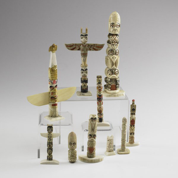 NATIVE AMERICAN: NATIVE AMERICAN; Ten bone or ivory carved and painted totems, 20th c.; One signed Eddy Syngoe; Tallest: 7 1/4''
