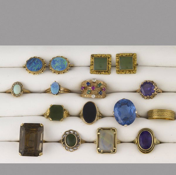 GROUP OF GOLD RINGS AND EARRINGS: GROUP OF GOLD RINGS AND EARRINGS. Sixteen pieces: two pairs screwback earrings; band ring marked Tiffany & Co.; gold and gemstone rings, sizes 4 1/2 - 7. 71.4 gs. GW
