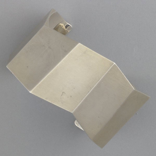 TIFFANY & CO. GEOMETRIC HINGED SILVER CUFF: TIFFANY & CO. GEOMETRIC HINGED SILVER CUFF. Designed by Frank Gehry. Marked Tiffany & Co. Gehry 925. 70.5 gs. GW, 2 1/2'' x 1 3/4''