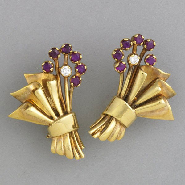 TIFFANY & CO. RUBY AND DIAMOND EARRINGS: TIFFANY & CO. RUBY AND DIAMOND EARRINGS. Floral motif, for pierced ears with diamonds, approx. .12 ct. TW and rubies, approx. .75 ct. TW in 14k yg, ca. 1940. Marked Tiffany & Co. 11.9 gs. GW, 1 1/8''