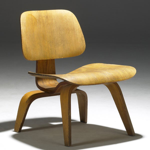 CHARLES AND RAY EAMES / EVANS PRODUCTS: CHARLES AND RAY EAMES; EVANS PRODUCTS; Early bleached mahogany laminate LCW; Unmarked; 24 1/2'' x 19 1/2'' x 23''