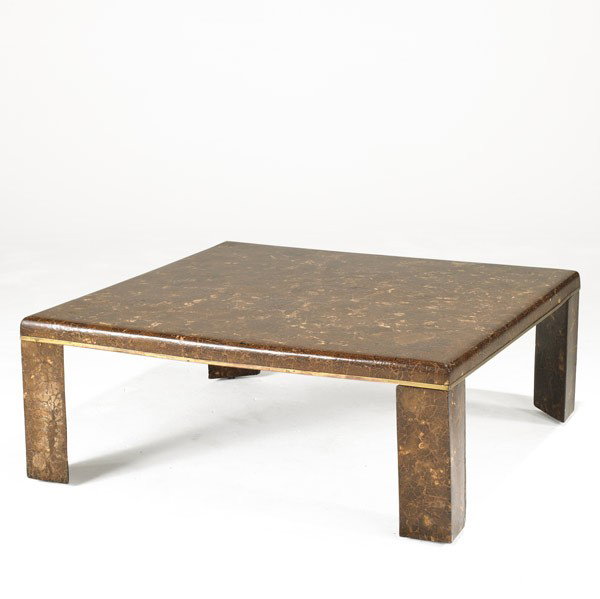 MAITLAND SMITH: MAITLAND SMITH; Shell encrusted coffee table with brass trim; Unmarked; 15 1/2'' x 40 1/2'' sq.