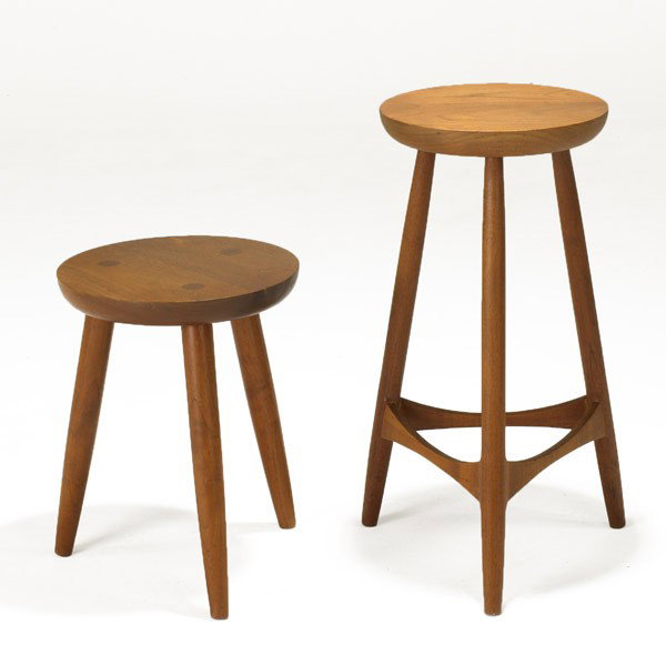 AMERICAN STUDIO: SIMON WATTS; Two sculpted walnut stools; One branded Simon Watts; Taller: 27'' x 16'' dia.