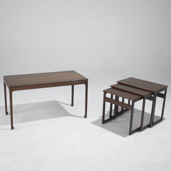 DANISH MODERN: DANISH MODERN; Rosewood coffee table together with nesting tables; Coffee table has paper label; 20 1/2'' x 37 1/2'' x 18 3/4''