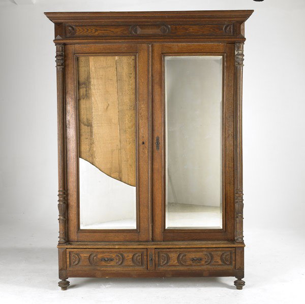 VICTORIAN FURNITURE: VICTORIAN FURNITURE; Oak two-door armoire with later back, as-found condition (missing shelves, hardware), together with disassembled oak wardrobe parts with carved panels, early 20th c., hardware, on