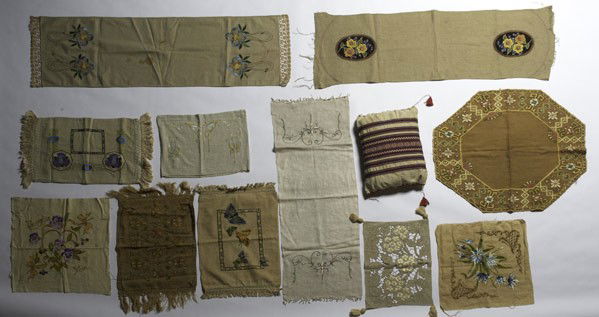 ARTS & CRAFTS TEXTILES: ARTS & CRAFTS TEXTILES; Twelve pieces: four table runners, placemat, four pillow shams, pillow and two faces, most linen and all embroidered; Largest: 53'' x 17''
