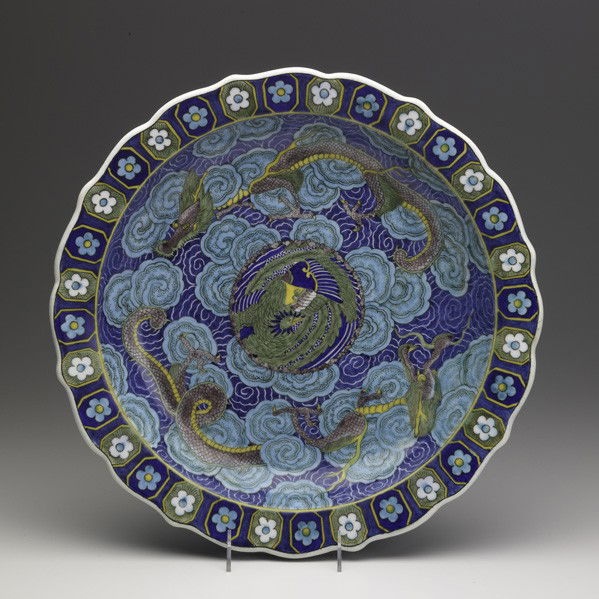 THEODORE DECK; Platter: THEODORE DECK; Large hanging platter painted with dragons and bird; Signed TH DECK; 3'' x 16 1/4''