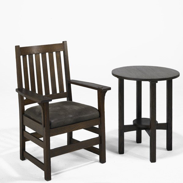 L. & J.G. STICKLEY; Lamp table and armchair: L. & J.G. STICKLEY; Lamp table and armchair; Branded ''The Work of...''; Table: 29'' x 24'', chair: 39 1/2'' x 26 3/4'' x 22''