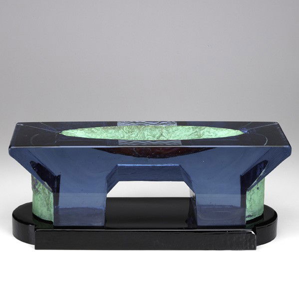 JOHN LEWIS; Sculpture: JOHN LEWIS; Two-piece cast glass sculpture, ''Buttress,'' USA, 1986; Provenance: Collection of Jean Heilbrunn; Habatat Galleries, Detroit, MI; Signed and dated; Sculpture: 6'' x 18'' x 5 3/4'', Base: