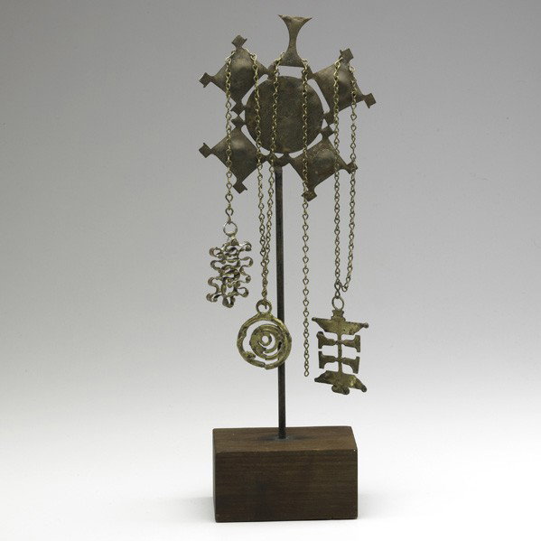 JOHN RISLEY; Jewelry stand with three necklaces: JOHN RISLEY; Jewelry stand with three necklaces, USA, c. 1965; Patinated metal, brass and cedar; Provenance: From the artist's family; Unmarked; Stand: 18'' x 5'' x 3 1/4''