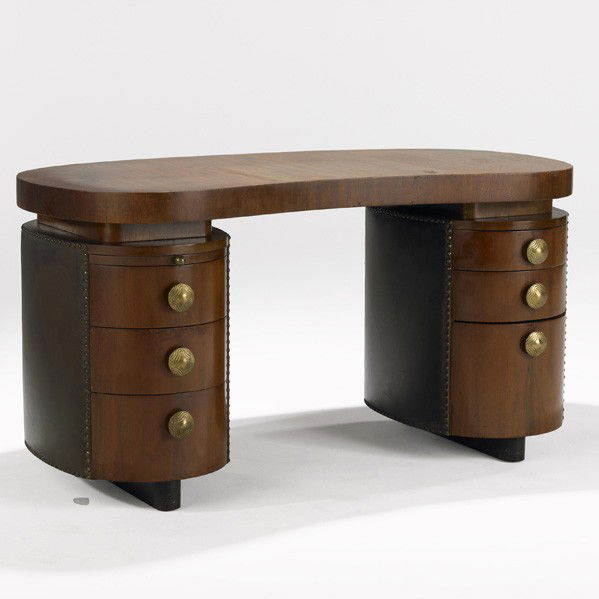 GILBERT ROHDE; HERMAN MILLER; Desk: GILBERT ROHDE; HERMAN MILLER; Double-pedestal desk, USA, 1940s; Paldao, leatherette and brass; Unmarked; 29 1/2'' x 56 1/4'' x 28''