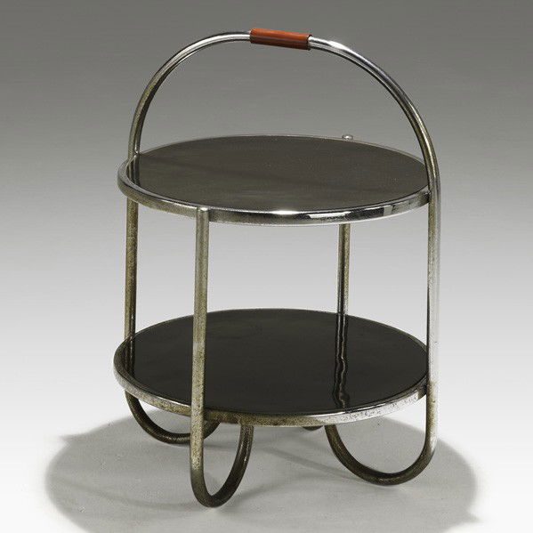 WOLFGANG HOFFMANN; HOWELL; Table: WOLFGANG HOFFMANN; HOWELL; Two-tiered table with handle, USA, 1930s; Nickel plated steel, laminate and bakelite; Unmarked; 26'' x 21 1/2'' dia.