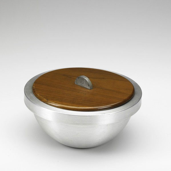RUSSEL WRIGHT; Lidded bowl: RUSSEL WRIGHT; RUSSEL WRIGHT INC.; Lidded bowl, USA, 1930s; Spun aluminum and walnut; Stamped Russel Wright; 4 1/2'' x 8 1/2''