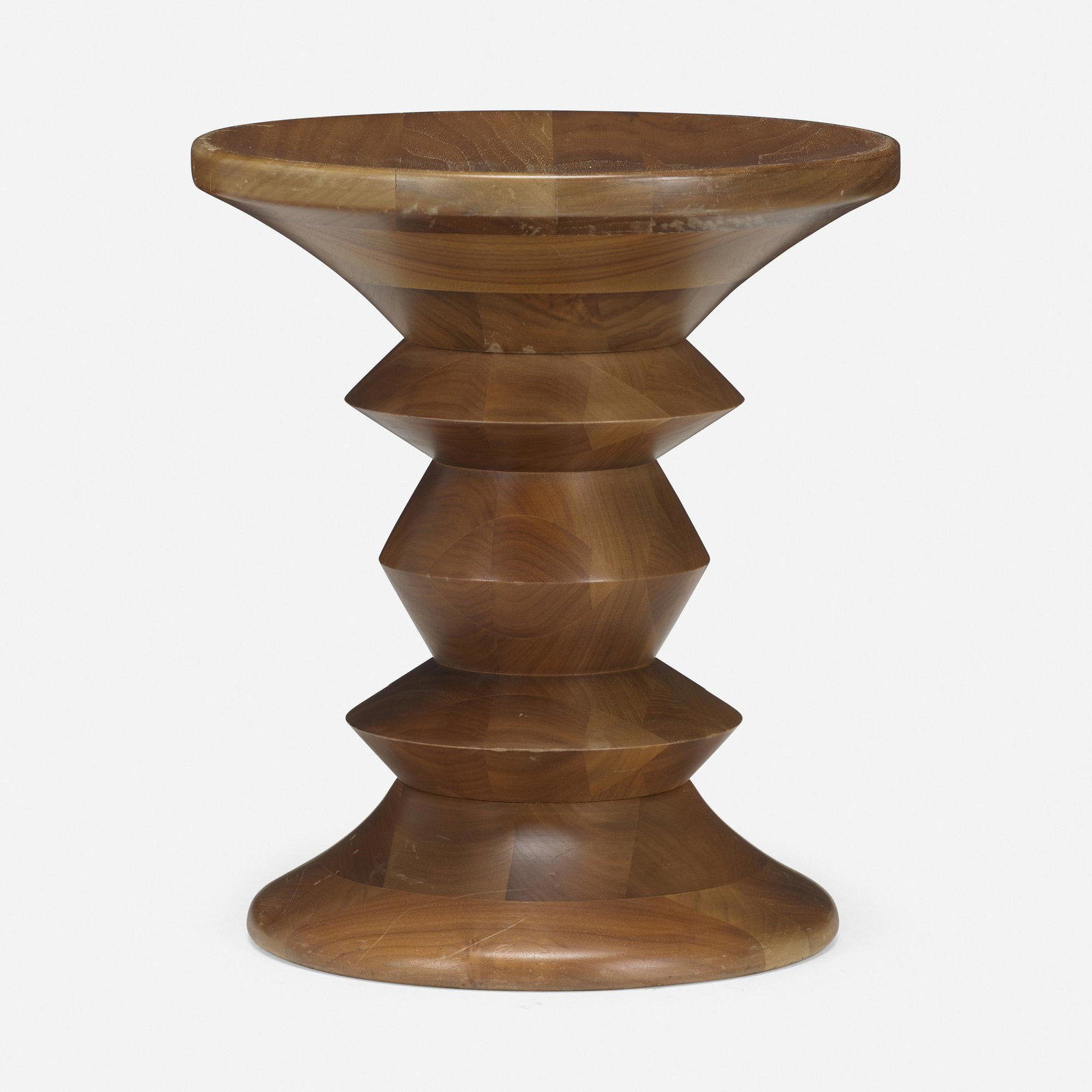Charles and Ray Eames, Time Life stool: Charles and Ray Eames Time Life stool Herman MillerUSA, 1960walnut 15 h × 13 dia in (38 × 33 cm) Literature: Eames Design: The Work of the Office of Charl