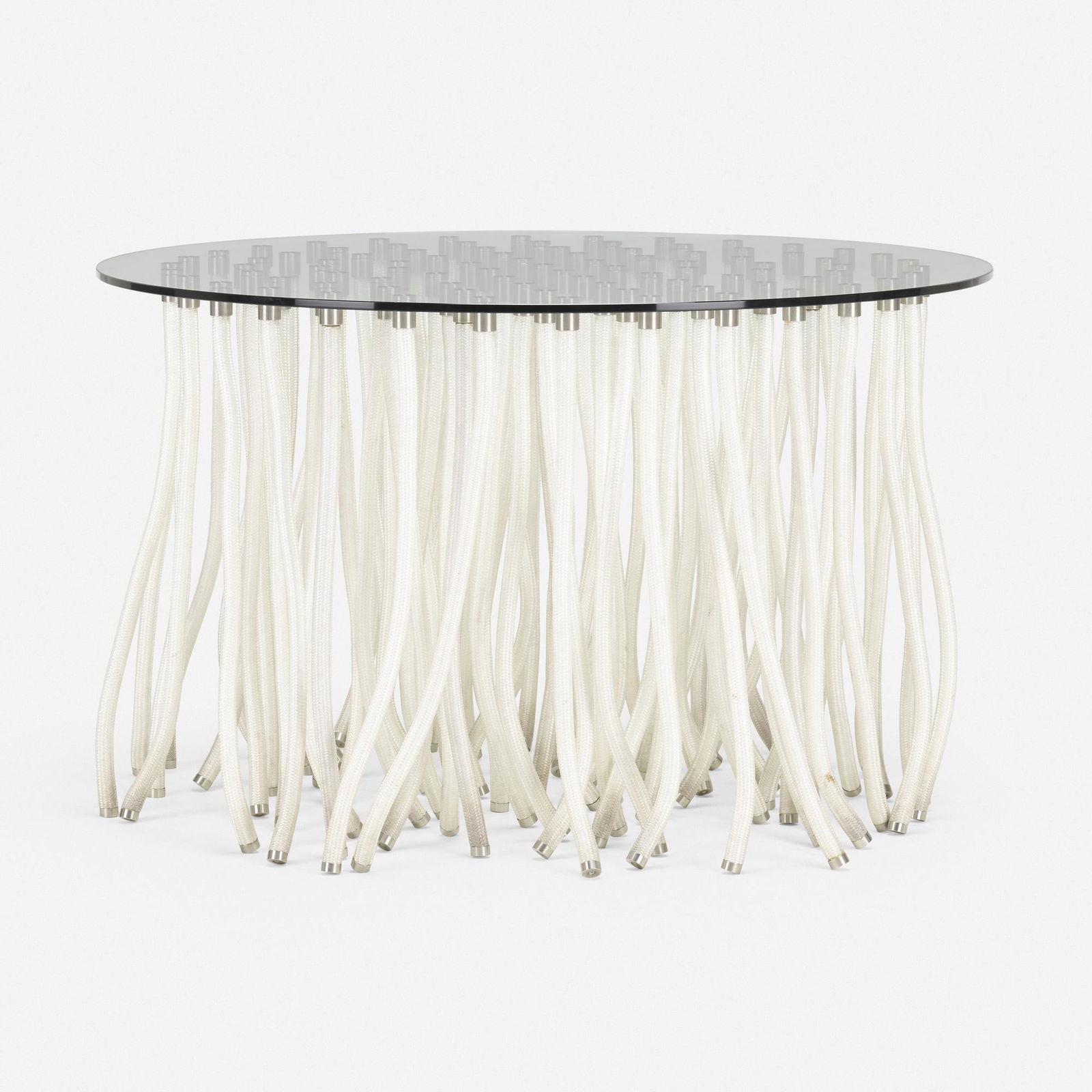 Fabio Novembre, Org table: Fabio Novembre Org table CappelliniItaly, 2001glass, nylon rope, aluminum 29 h × 47.25 dia in (74 × 120 cm) Provenance: Private Collection, New York