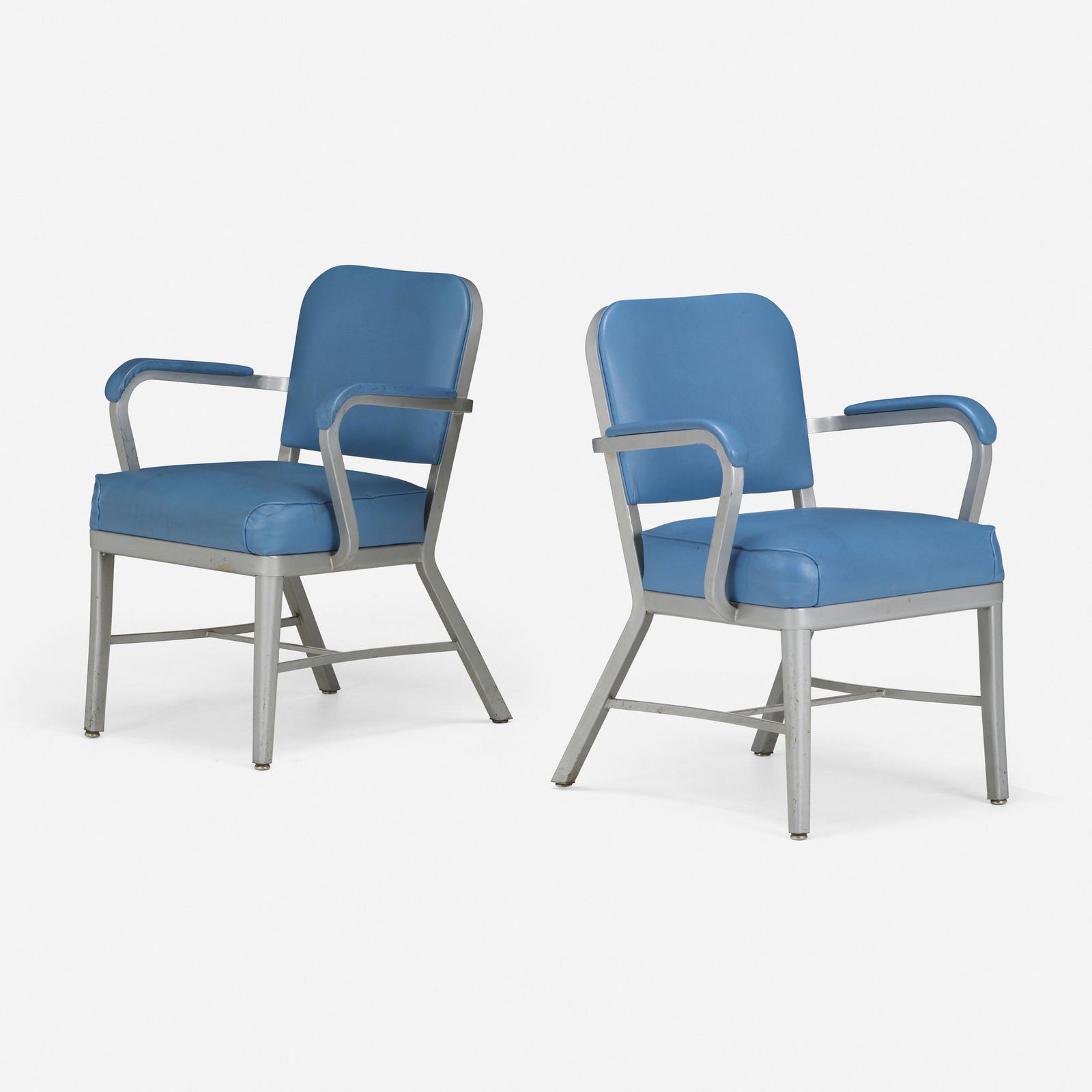 Cole Steel Inc., Tanker armchairs, pair: Cole Steel Inc. Tanker armchairs, pair USA, c. 1955enameled steel, vinyl 31.5 h × 23 w × 22 d in (80 × 58 × 56 cm) Metal manufacturer's label to back of each example 'C