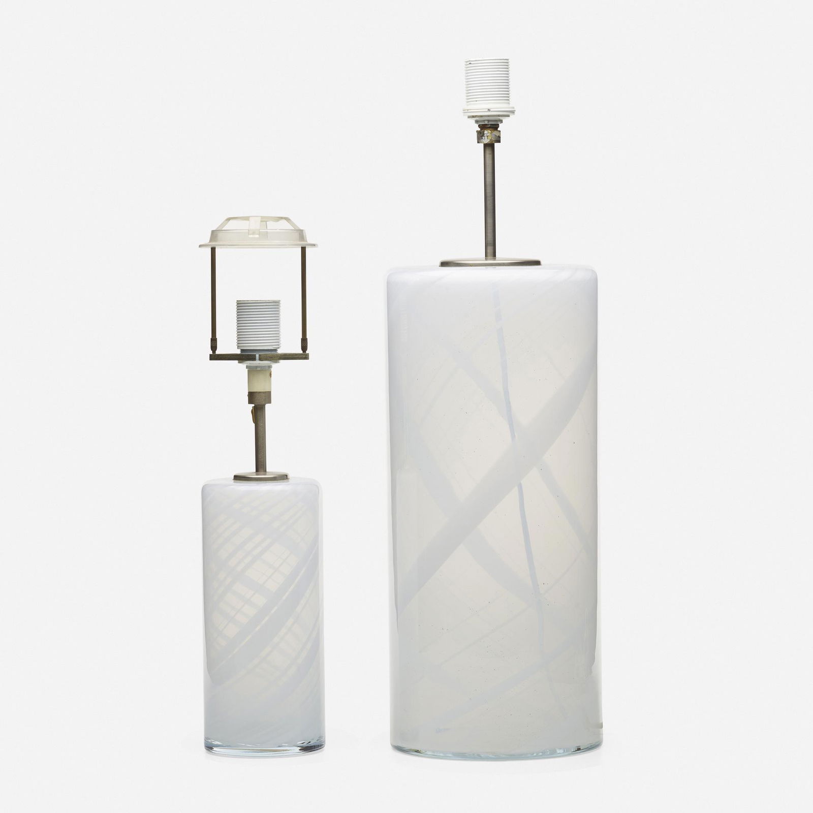 Torben Jorgensen, Misty table lamps, set of two: Torben Jorgensen Misty table lamps, set of two HolmegaardDenmark, c. 1975opaline glass, metal 24 h × 7.5 dia in (61 × 19 cm) 22.25 h × 4.25 dia in (57 × 11 cm)