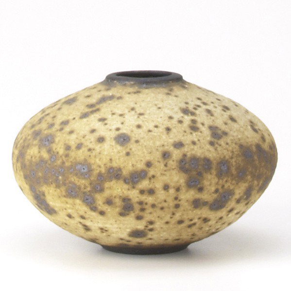 VIVIKA & OTTO HEINO: VIVIKA AND OTTO HEINO; Ridged vessel covered in brown and ochre speckled volcanic glaze. Incised ''Vivika + Otto''; 5'' x 8 1/2'' dia.