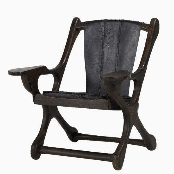 DON SHOEMAKER / SENAL: DON SHOEMAKER; SENAL; Rocking lounge chair; Mexico, 1970s; Rosewwod and leather; Unmarked; 32'' x 30 1/2'' x 30''