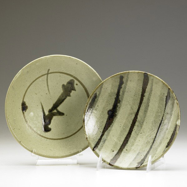 SHOJI HAMADA: SHOJI HAMADA; Two shallow slip glazed dishes; One with paper label; Largest: 7 1/2'' dia
