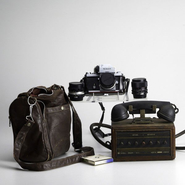 COLLECTIBLES: COLLECTIBLES; Nikon F series camera and a Dictograph seven switch telephone, c. 1920; Dictograph: 8'' x 8 3/4'' x 6 1/2''