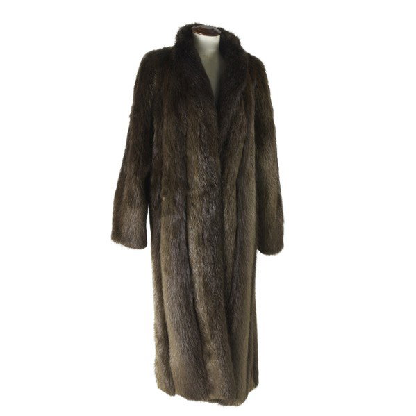 BEAVER FUR COAT: BEAVER FUR COAT. Supple beaver fur calf-length swing coat with tuxedo collar, hidden hook closure and hidden inner pocket, with original tags and invoice. Approx. size 10-12, 48'' long