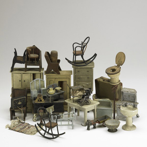 DOLL FURNITURE: DOLL FURNITURE; Approx. eighty pieces, 19th/20th c.: wooden Hoosier, metal bed, plaster sink and wash tub, metal tea cart, metal stoves, etc.