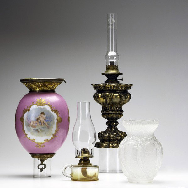 ANTIQUE LIGHTING: ANTIQUE LIGHTING; Four pieces, 19th/20th c.: Victorian egg-shaped hand-painted glass hanging fixture with gilt mountings, etched and molded frosted glass shade and two kerosene lamps; Tallest: 16'' (t