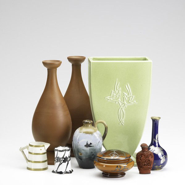 ROOKWOOD / BELLEEK, ETC: ROOKWOOD; BELLEEK, ETC; Nine pieces: pair of redware vases, small Rookwood jug, Nicholas Hirschfeld, 1883; Rosenthal cat pin holder, bud vase, covered dish, Bellek pitcher, cinnabar snuff bottle and T