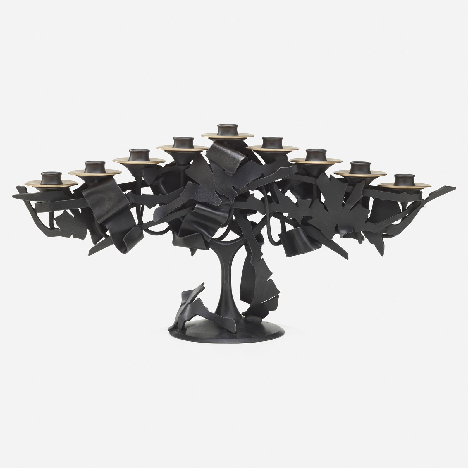Albert Paley, Menorah: Albert Paley Menorah USA, 2013forged mild steel with a blackened patina, removable brass bobeches (collars) 10.75 h × 22.5 w × 6 d in (27 × 57 × 15 cm) Impressed signat