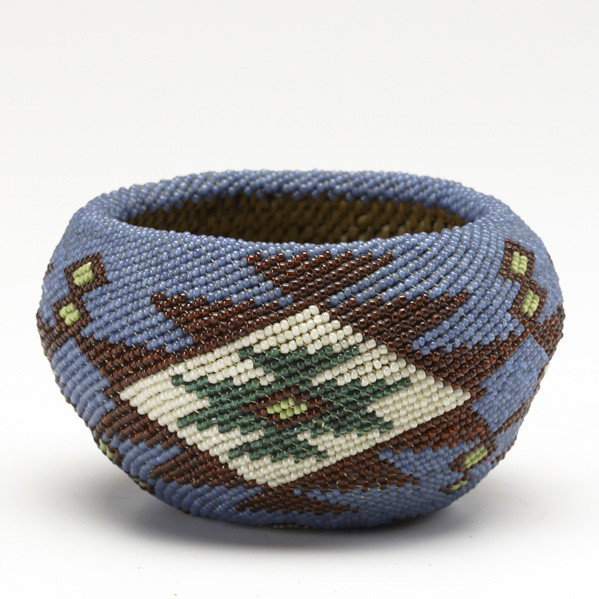 PAIUTE BASKET: PAIUTE BASKET; Blue, red and green beaded decoration, ca. 1930-1949; 2 3/4'' x 4 1/2'' dia.