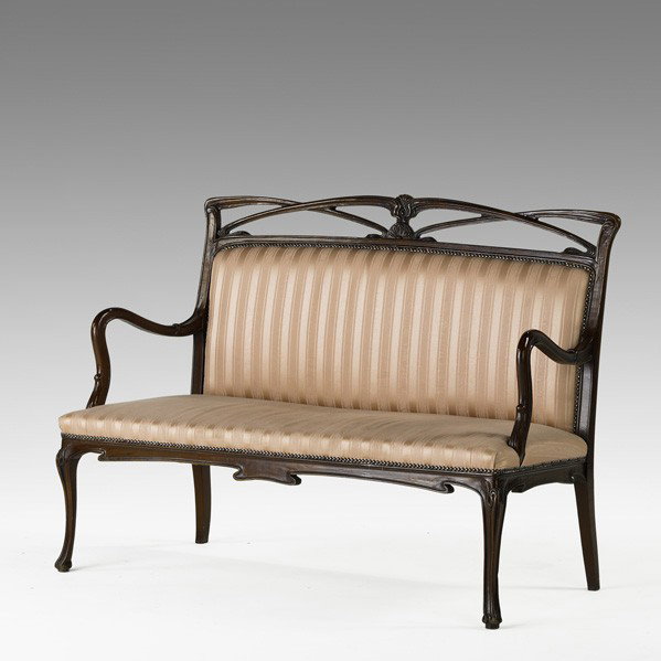 ART NOUVEAU SETTEE: ART NOUVEAU SETTEE; Mahogany frame with striped upholstery, ca. 1890-1910; 39'' x 53'' x 24''