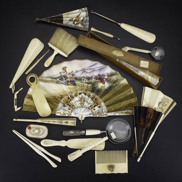 IVORY GROUPING: IVORY GROUPING; Approx. twenty items, 20th c.: includes magnifying glasses, fans, shoe horns, etc.; Largest: 9 1/2''
