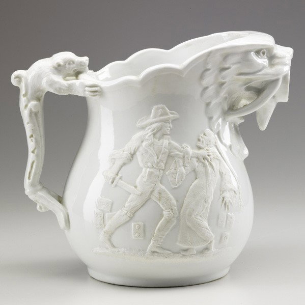 KARL L.H. MUELLER; Pitcher: KARL MUELLER; UNION PORCELAIN WORKS; Glazed porcelain jasperware pitcher,''Heathen Chinee,'' 1876-80; Note: particularly rare in palest celadon glaze; Initialed; 9 1/4'' x 10 3/4''