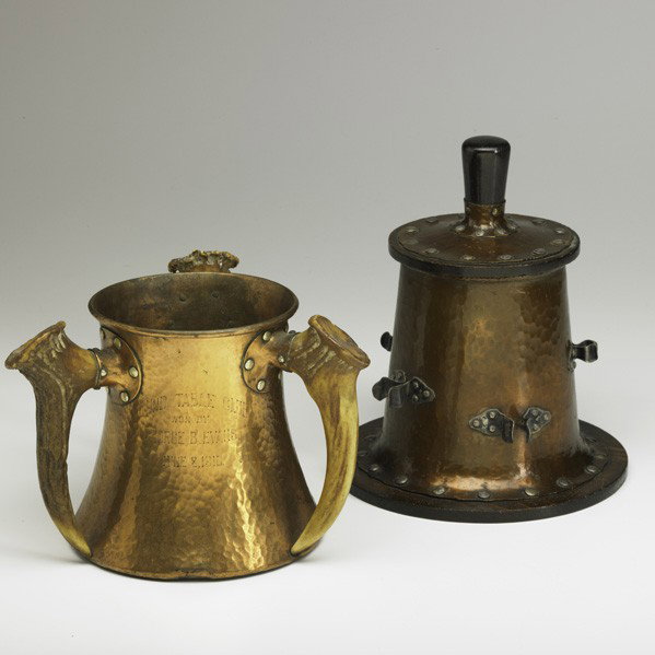 JOSEPH HEINRICHS; Presentation cup: JOSEPH HEINRICHS; J.C. GROGAN & CO; Presentation cup and humidor; Hammered copper, silver, horn, wood; Cup inscribed ROUND TABLE CLUB WON BY GEORGE B EVANS JUNE 8, 1910; Cup marked COPPER & SILVER 210