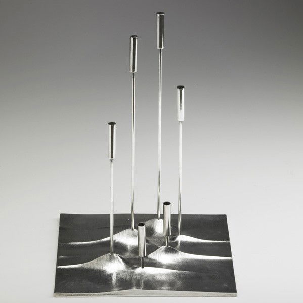 TAPIO WIRKKALA; Sol Lunaire candelabrum: TAPIO WIRKKALA; CHRISTOFLE; Sol Lunaire candelabrum, Finland, ca. 1959; Silver-plated metal; Stamped Christofle France; 13'' x 7 1/2'' x 8 3/4''