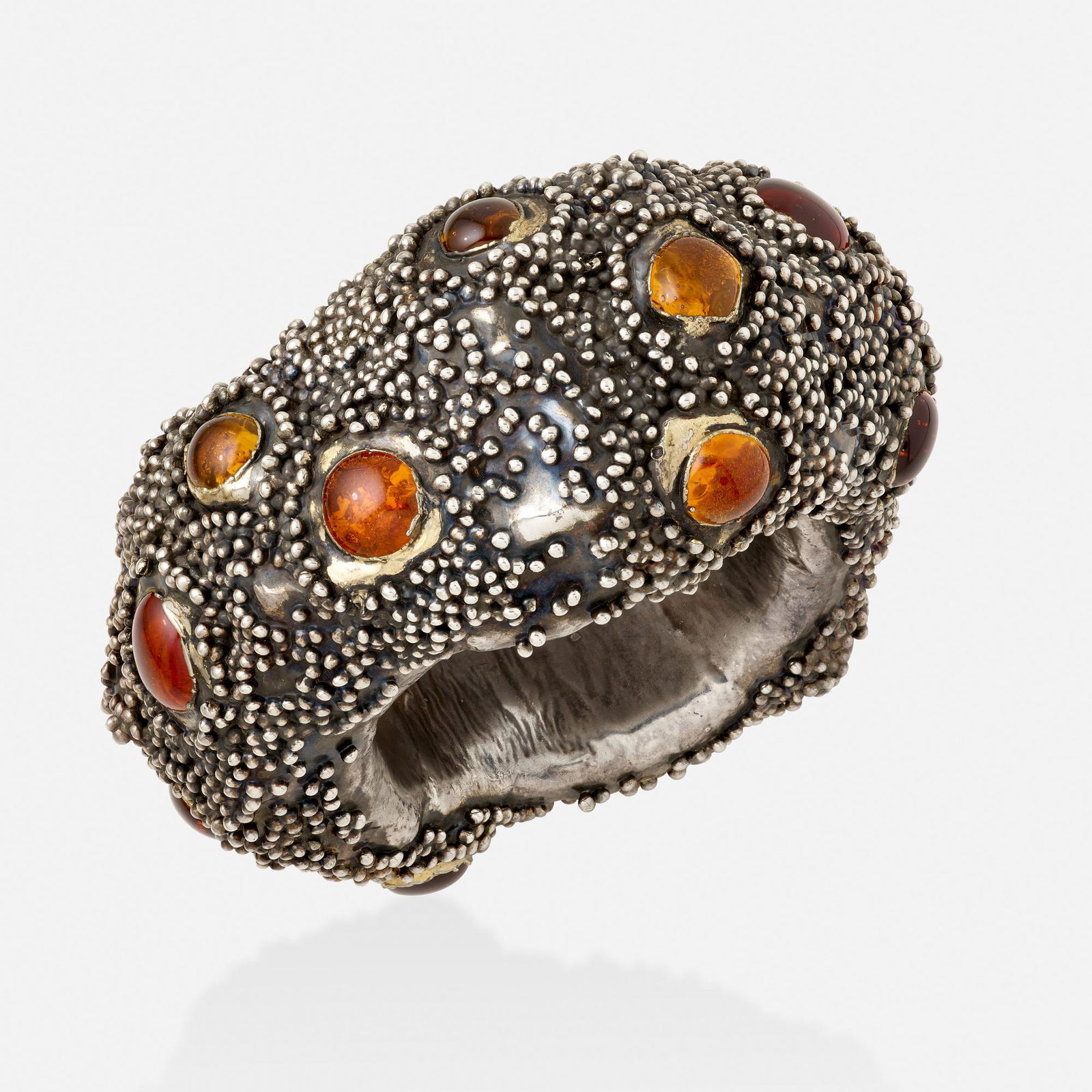 Giorgio Vigna, Silver and Murano glass bangle: Giorgio Vigna Silver and Murano glass bangle bracelet Of undulating form, with orange Murano glass and silver granulationPart of the Sasso CollectionOxidized silver Signed Giorgio Vigna Inner circ. 8