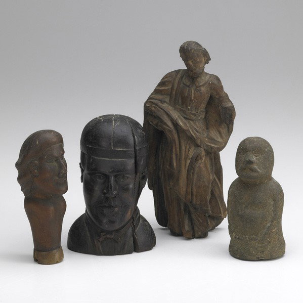 CARVED FIGURE GROUPING: CARVED FIGURE GROUPING; Ten include figures and heads in clay, stone, metal or wood, age uncertain; Tallest: 7''