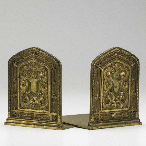 TIFFANY & CO.: TIFFANY & CO.; Dore bronze bookends with elaborate decoration, early 20th c.; No. 20890-2; 5 1/2'' x 5 1/2'' x 4 3/4''