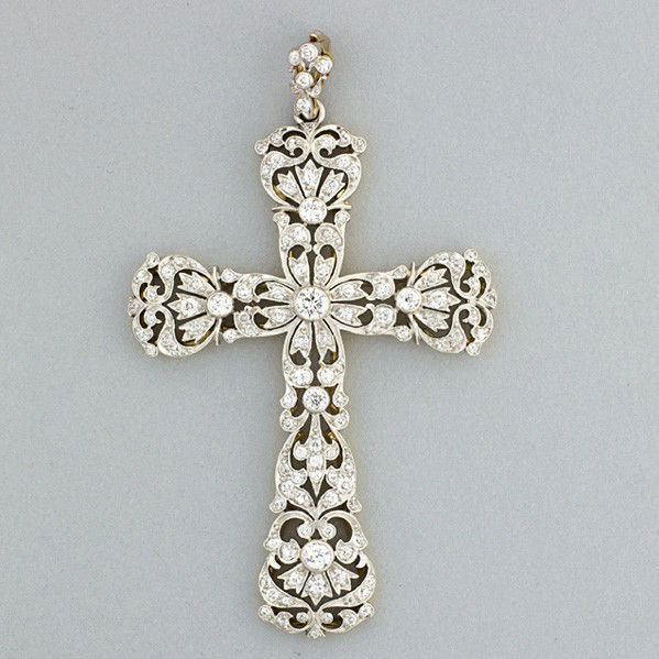 TIFFANY & CO. DIAMOND PLATINUM TOPPED GOLD CROSS: TIFFANY & CO. DIAMOND PLATINUM TOPPED GOLD CROSS, ca. 1895. Open diamond lace in the Renaissance Revival manner of Paulding Farnham, OEC diamonds, approx. 2 cts. TW. (Effaced mark of Tiffany & Co.) 9.