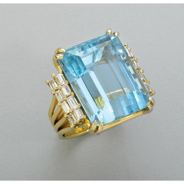 BRAZILIAN AQUAMARINE DIAMOND 18K RING: BRAZILIAN AQUAMARINE DIAMOND 18K RING. Retailed by H. Stern, apparently unmarked. Rectangular step-cut aquamarine, 24.8 cts. by formula, and baguette cut diamond double row shoulders, approx. 1.2 cts.