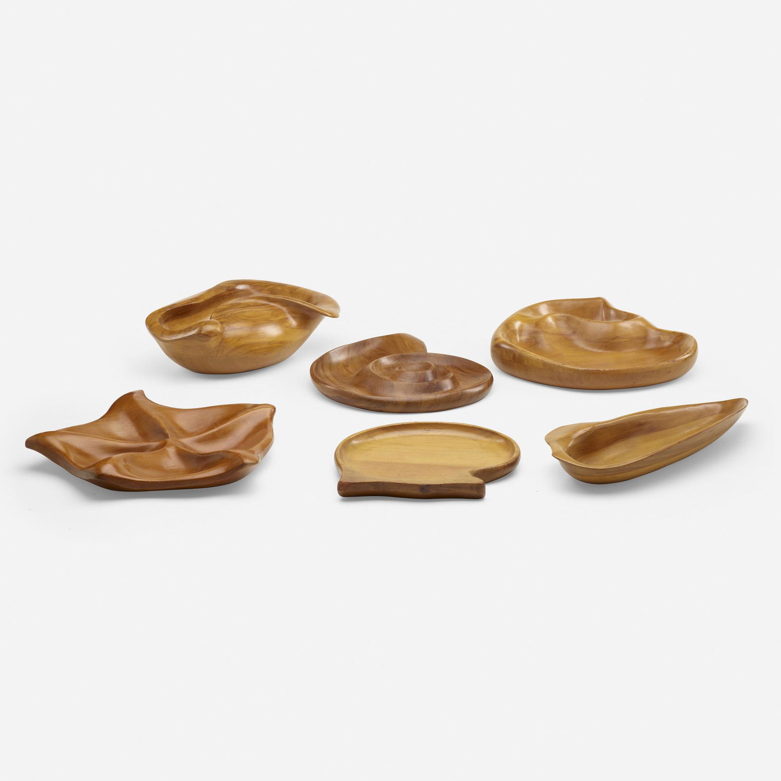 Russel Wright, Oceana bowls, set of six: Russel Wright Oceana bowls, set of six Klise Manufacturing CompanyUSA, c. 1935olivewood, cherry .75 h x 9 dia in (2 x 23 cm) 2.5 h x 12 w x 13.5 d in (6 x 30 x 34 cm) Branded signatur