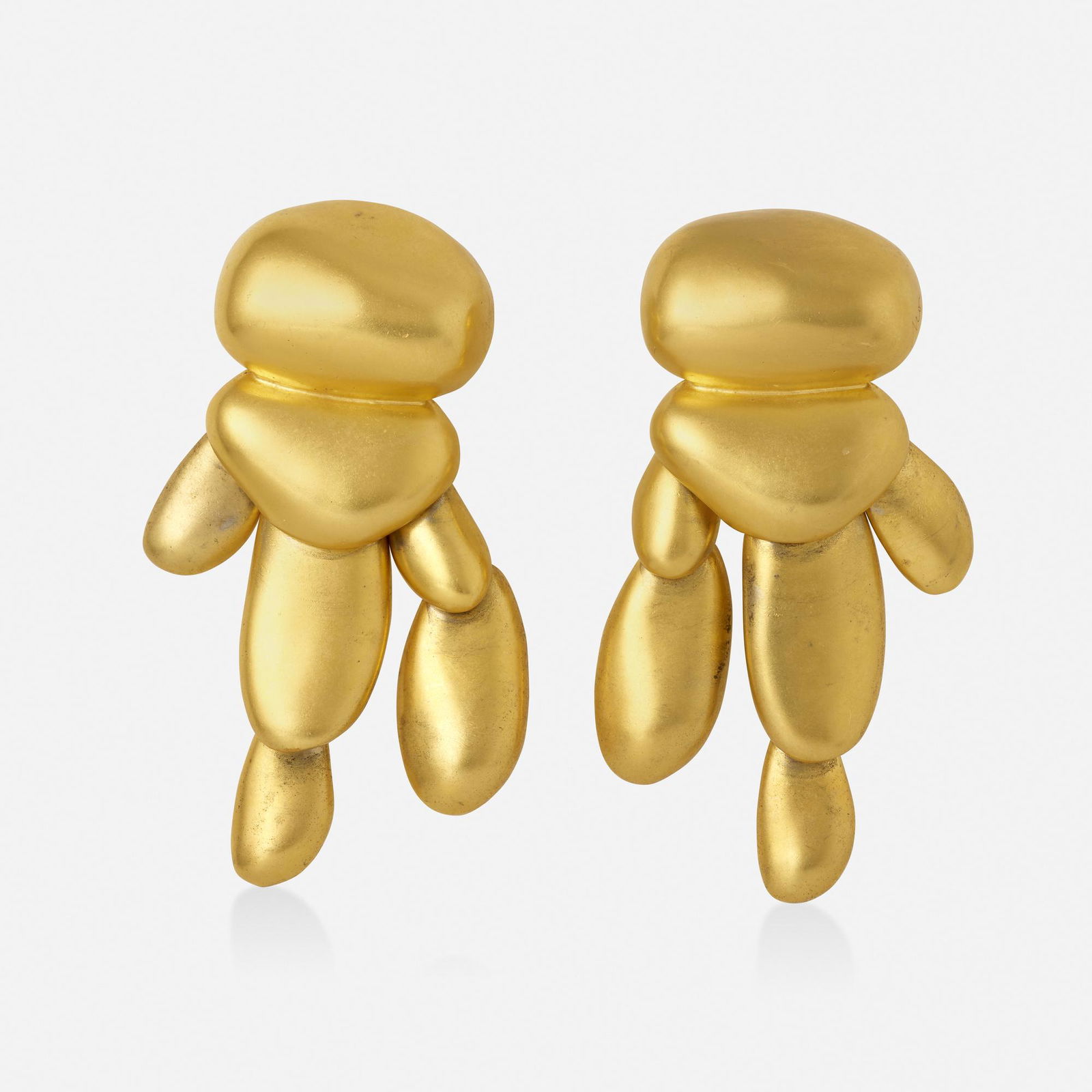 Robert Lee Morris, DK, 'Pebble Goddess' earrings: Robert Lee Morris for Donna Karan 'Pebble Goddess' gold-plated brass earrings Each designed as a cluster of articulated pebbles Unsigned; c. 1989 Gold-plated brass 3 x 2.75 in; Gross weight 28.8 dwts