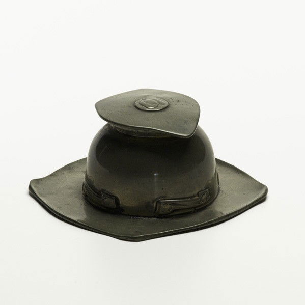 ARCHIBALD KNOX; LIBERTY CO.: ARCHIBALD KNOX; LIBERTY CO.; Tudric pewter inkwell with glass insert; Impressed Tudric/0140; 2 3/4'' x 5 1/4'' sq.