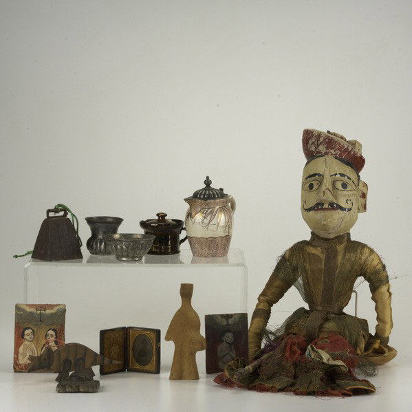 BOX LOT: BOX LOT; Approx. thirty pieces: Folk art carved wood-fist cane, two miniature South American paintings, Middle Eastern puppet, etc; Longest: 36''